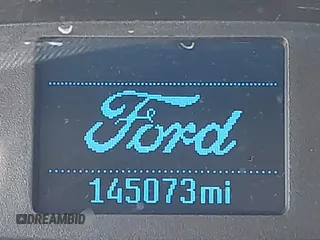 2016 Ford Transit Cargo z VIN 1FTYR1YM3GKA01650, wystawiony jako IAAI lot #41242238 z przebiegiem 145 073 mil mil oraz . Historia ofert i sprzedaży dostępna na DreamBid. Obrazek 16.