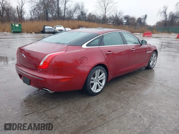 2011 Jaguar XJ XJL with VIN SAJWA2GB2BLV17863, listed as a IAAI auction lot 41576809 with 94,090 mi miles and . Bid and sale history available at DreamBid. Image 4.