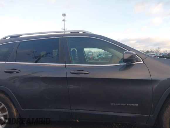 2016 Jeep Cherokee Latitude z VIN 1C4PJMCB4GW141886, wystawiony jako IAAI lot #41215064 z przebiegiem 122 794 mil mil oraz . Historia ofert i sprzedaży dostępna na DreamBid. Obrazek 14.