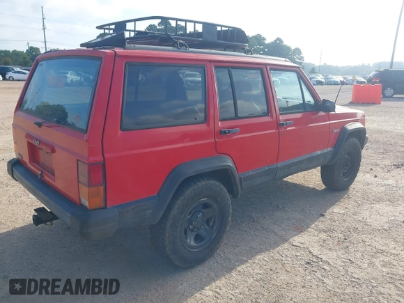 1996 Jeep Cherokee Sport with VIN 1J4FT68S4TL326973, listed as a IAAI auction lot 42744791 with 215,905 mi miles and . Bid and sale history available at DreamBid. Image 4.