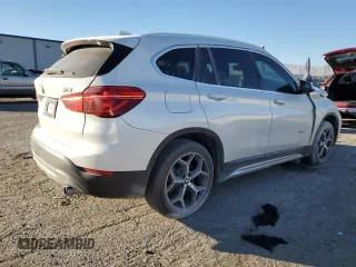 2018 BMW X1 xDrive28i with VIN WBXHT3C36J5K21286, listed as a Copart auction lot 88702365 with 0 mi miles and Salvage Title. Bid and sale history available at carsss.com. Image 3.