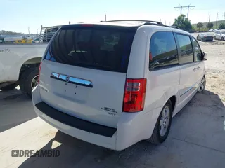 2010 Dodge Grand Caravan SXT with VIN 2D4RN5D1XAR462150, listed as a IAAI auction lot 41466381 with 204,531 mi miles and . Bid and sale history available at DreamBid. Image 4.