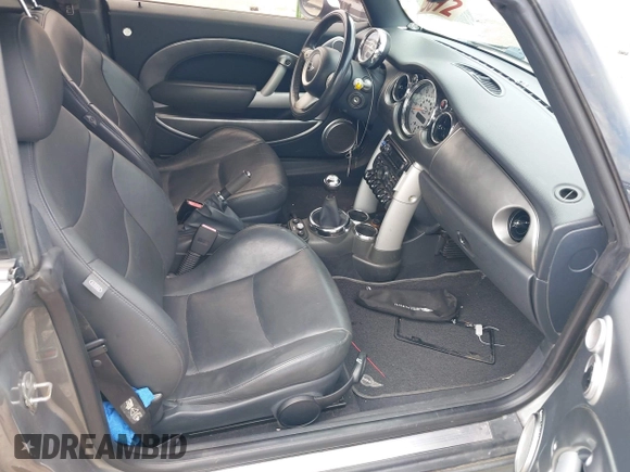2006 MINI Convertible S with VIN WMWRH33586TF87791, listed as a IAAI auction lot 42679478 with 90,209 mi miles and . Bid and sale history available at DreamBid. Image 5.