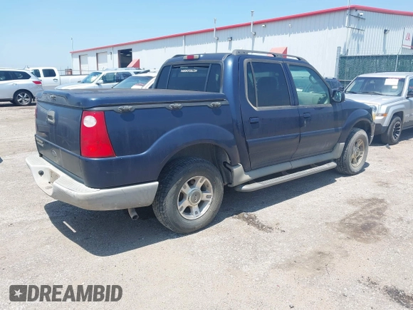 2003 Ford Explorer Sport Trac XLS z VIN 1FMZU77E53UB66531, wystawiony jako IAAI lot #42509028 z przebiegiem 199 323 mil mil oraz . Historia ofert i sprzedaży dostępna na DreamBid. Obrazek 4.