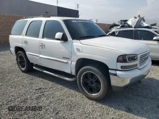 2001 GMC Yukon SLT z VIN 1GKEC13T51J117159, wystawiony jako Copart lot #55241255 z przebiegiem 209 440 mil mil oraz Szkoda całkowita • Salvage title. Historia ofert i sprzedaży dostępna na DreamBid. Obrazek 4.
