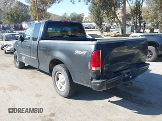 2000 Ford F-150 XL with VIN 1FTRX17W3YNB90314, listed as a IAAI auction lot 41825498 with 369,372 mi miles. Bid and sale history available at carsss.com. Image 3.