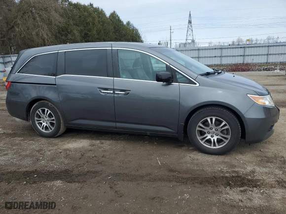 2012 Honda Odyssey EX-L with VIN 5FNRL5H61CB508181, listed as a Copart auction lot 52174205 with 203,763 mi miles and Salvage Title. Bid and sale history available at carsss.com. Image 4.