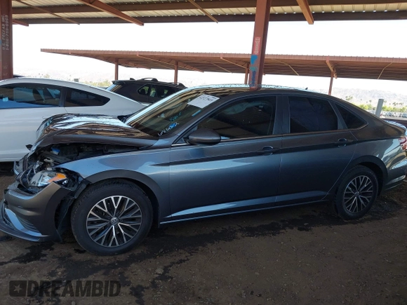 2019 Volkswagen Jetta S with VIN 3VWC57BU0KM102323, listed as a IAAI auction lot 42327869 with 68,662 mi miles and . Bid and sale history available at DreamBid. Image 14.