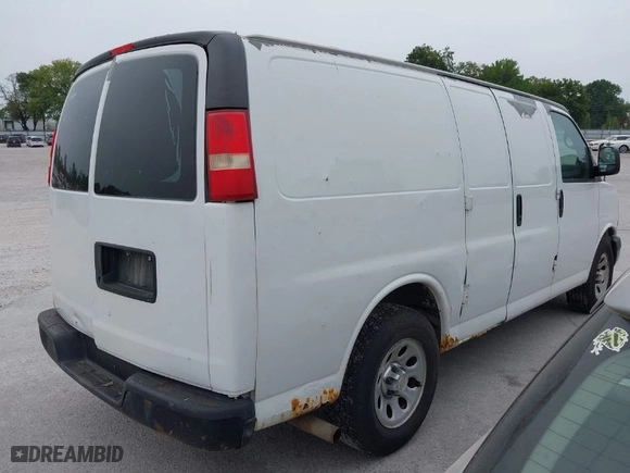 2012 Chevrolet Express Cargo Van with VIN 1GCSGAFX7C1124523, listed as a IAAI auction lot 40328756 with 266,445 mi miles. Bid and sale history available at carsss.com. Image 4.