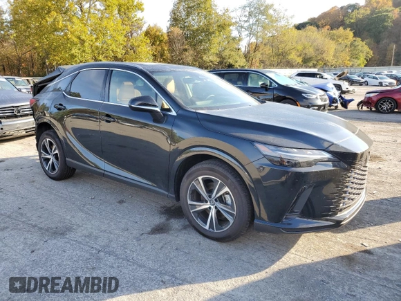 2023 Lexus RX with VIN 2T2BAMCA2PC013409, listed as a Copart auction lot 71721004 with 10,615 mi miles and Salvage Title. Bid and sale history available at carsss.com. Image 4.