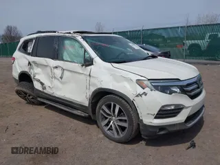 2016 Honda Pilot Touring with VIN 5FNYF6H90GB102403, listed as a IAAI auction lot 42007825 with 69,450 mi miles. Bid and sale history available at carsss.com. Image 1.