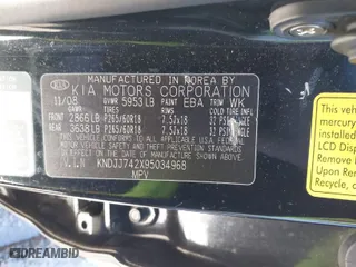 2009 Kia Borrego EX with VIN KNDJJ742X95034968, listed as a IAAI auction lot 41411206 with 146,584 mi miles. Bid and sale history available at carsss.com. Image 9.