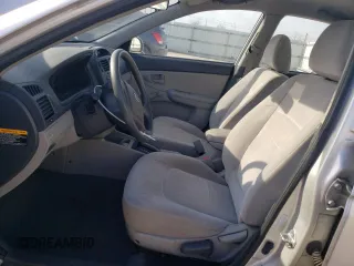 2009 Kia Spectra LX with VIN KNAFE221895659552, listed as a Copart auction lot 82555924 with 114,704 mi miles and Salvage Title. Bid and sale history available at carsss.com. Image 7.