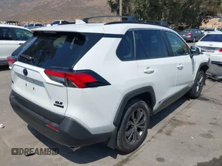 2024 Toyota RAV4 Hybrid XLE Premium with VIN JTMB6RFV9RJ063328, listed as a IAAI auction lot 42433233 with 9,874 mi miles and . Bid and sale history available at DreamBid. Image 4.