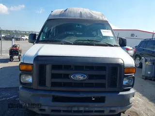 2012 Ford Econoline Cargo Commercial with VIN 1FTNS2EW4CDA50633, listed as a IAAI auction lot 40694015 with 309,334 mi miles. Bid and sale history available at carsss.com. Image 12.