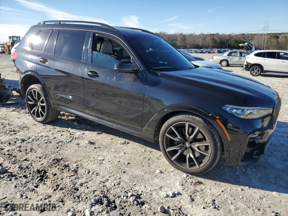 2019 BMW X7 xDrive50i with VIN 5UXCX4C51KLB39547, listed as a Copart auction lot 87908475 with 77,104 mi miles and Salvage Title. Bid and sale history available at carsss.com. Image 4.