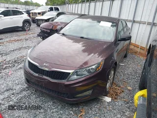 2013 Kia Optima EX z VIN 5XXGN4A71DG133275, wystawiony jako IAAI lot #42183941 z przebiegiem 173 807 mil mil oraz . Historia ofert i sprzedaży dostępna na DreamBid. Obrazek 2.
