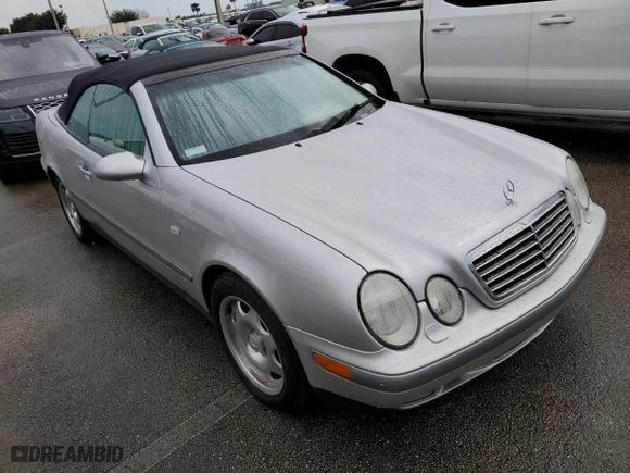 1999 Mercedes-Benz CLK-Class with VIN WDBLK65GXXT023566, listed as a Copart auction lot 73857834 with 0 mi miles and Salvage Title. Bid and sale history available at carsss.com. Image 4.