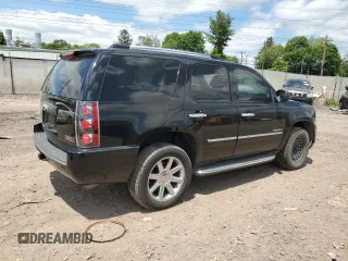 2011 GMC Yukon Denali z VIN 1GKS2EEF2BR308951, wystawiony jako Copart lot #57052825 z przebiegiem 217 895 mil mil oraz Tytuł czysty. Historia ofert i sprzedaży dostępna na DreamBid. Obrazek 3.