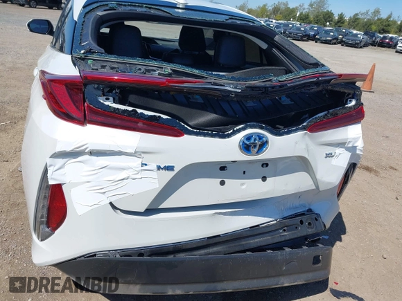 2021 Toyota Prius LE with VIN JTDKAMFP2M3184900, listed as a IAAI auction lot 42014569 with 81,563 mi miles and . Bid and sale history available at DreamBid. Image 6.