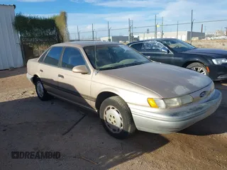 1992 Ford Taurus GL z VIN 1FALP52U4NG183123, wystawiony jako IAAI lot #41731014 z przebiegiem 98 323 mil mil oraz . Historia ofert i sprzedaży dostępna na DreamBid. Obrazek 1.