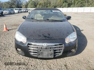 2004 Chrysler Sebring LXi z VIN 1C3EL55R74N121400, wystawiony jako Copart lot #80369614 z przebiegiem Nie podano mil oraz Nie do naprawy. Historia ofert i sprzedaży dostępna na DreamBid. Obrazek 5.