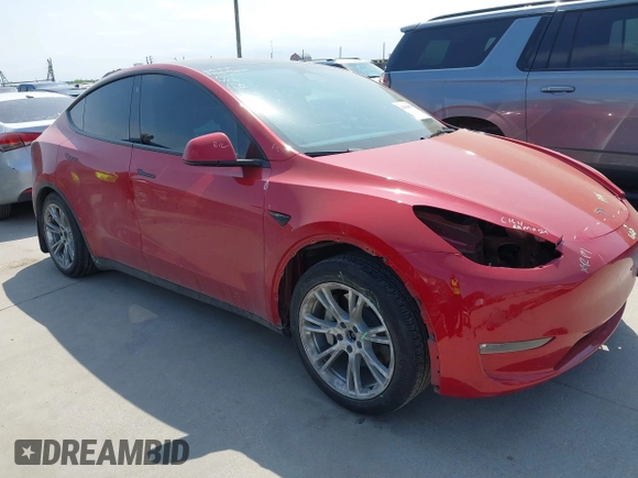 2023 Tesla Model Y Long Range z VIN 7SAYGAEE7PF691499, wystawiony jako IAAI lot #42038850 z przebiegiem 26 439 mil mil oraz . Historia ofert i sprzedaży dostępna na DreamBid. Obrazek 1.