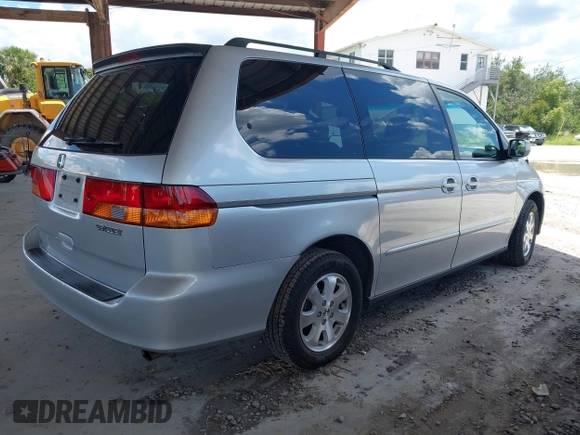 2003 Honda Odyssey EX-L z VIN 5FNRL18933B087714, wystawiony jako IAAI lot #42510813 z przebiegiem 145 360 mil mil oraz . Historia ofert i sprzedaży dostępna na DreamBid. Obrazek 4.