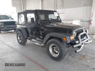 1997 Jeep Wrangler Sport with VIN 1J4FY19S4VP437604, listed as a IAAI auction lot 42456905 with 187,148 mi miles and . Bid and sale history available at DreamBid. Image 1.