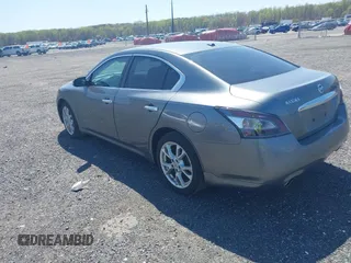 2014 Nissan Maxima SV with VIN 1N4AA5AP1EC458409, listed as a IAAI auction lot 42056758 with 103,570 mi miles and . Bid and sale history available at DreamBid. Image 3.