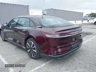 2023 Lucid Air Pure z VIN 50EA1PFA4PA006331, wystawiony jako IAAI lot #42213426 z przebiegiem 13 287 mil mil oraz . Historia ofert i sprzedaży dostępna na DreamBid. Obrazek 3.