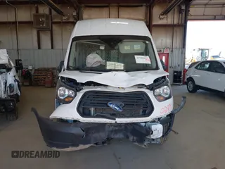 2019 Ford Transit Cargo with VIN 1FTBW3XG4KKA66859, listed as a IAAI auction lot 41940297 with 175,609 mi miles. Bid and sale history available at carsss.com. Image 12.