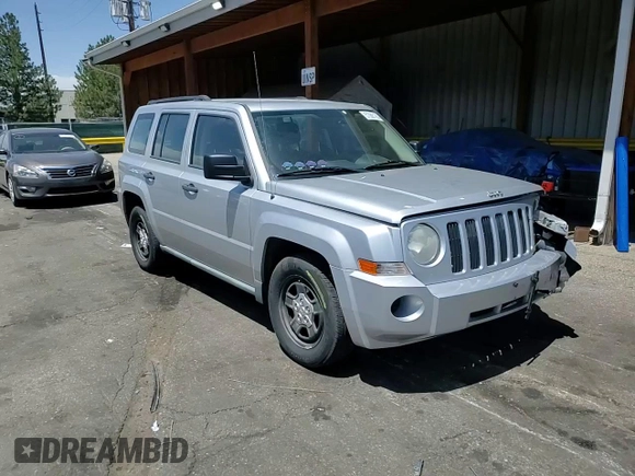 2010 Jeep Patriot Sport z VIN 1J4NT2GB4AD523378, wystawiony jako Copart lot #57088185 z przebiegiem 119 937 mil mil oraz Szkoda całkowita • Salvage title. Historia ofert i sprzedaży dostępna na DreamBid. Obrazek 14.