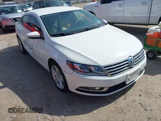 2013 Volkswagen CC Sport with VIN WVWBN7AN5DE503125, listed as a IAAI auction lot 41581088 with 128,964 mi miles and . Bid and sale history available at DreamBid. Image 1.