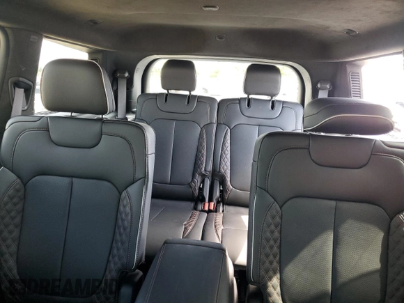 2023 Jeep Grand Cherokee Summit Reserve with VIN 1C4RJKEG5P8853916, listed as a Copart auction lot 52691735 with 18,899 mi miles and Salvage title. Bid and sale history available at DreamBid. Image 10.