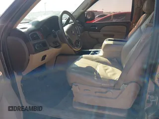 2011 Chevrolet Suburban LT with VIN 1GNSCJE03BR381301, listed as a IAAI auction lot 41412636 with 243,601 mi miles. Bid and sale history available at carsss.com. Image 5.