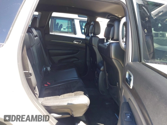 2018 Jeep Grand Cherokee Altitude with VIN 1C4RJEAG2JC404009, listed as a IAAI auction lot 42691304 with 60,948 mi miles and . Bid and sale history available at DreamBid. Image 8.