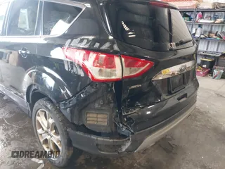 2015 Ford Escape Titanium with VIN 1FMCU9J98FUC70495, listed as a IAAI auction lot 41978543 with 129,974 mi miles. Bid and sale history available at carsss.com. Image 6.