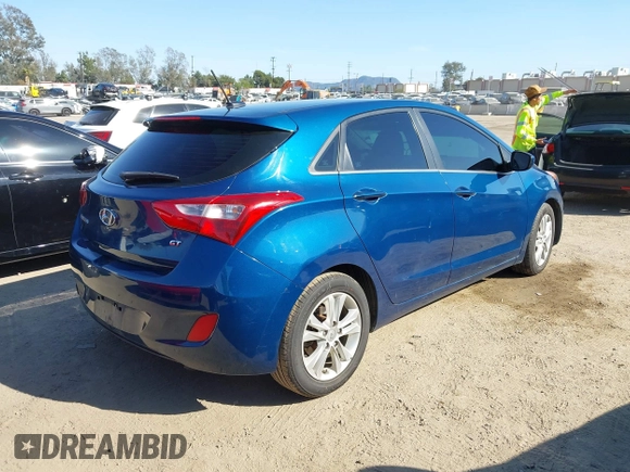 2014 Hyundai Elantra GT with VIN KMHD35LHXEU230812, listed as a IAAI auction lot 41855509 with 122,729 mi miles. Bid and sale history available at carsss.com. Image 4.