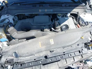 2013 Ford Fusion SE Hybrid z VIN 3FA6P0LU9DR349321, wystawiony jako IAAI lot #42156321 z przebiegiem 90 688 mil mil oraz . Historia ofert i sprzedaży dostępna na DreamBid. Obrazek 10.
