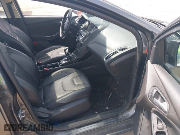 2017 Ford Focus Titanium with VIN 1FADP3J27HL306546, listed as a IAAI auction lot 42480576 with 114,285 mi miles and . Bid and sale history available at DreamBid. Image 5.