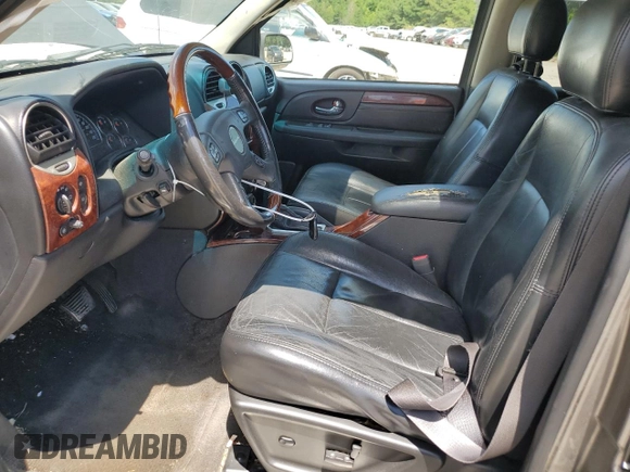 2006 GMC Envoy Denali with VIN 1GKET63M662285870, listed as a Copart auction lot 59828134 with 262,804 mi miles and Salvage Title. Bid and sale history available at DreamBid. Image 7.