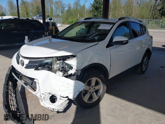2014 Toyota RAV4 XLE with VIN JTMRFREV6EJ002755, listed as a IAAI auction lot 42021556 with 133,570 mi miles. Bid and sale history available at carsss.com. Image 2.