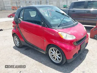 2010 Smart fortwo Pure z VIN WMEEJ3BA2AK359691, wystawiony jako IAAI lot #42449986 z przebiegiem 110 395 mil mil oraz . Historia ofert i sprzedaży dostępna na DreamBid. Obrazek 1.