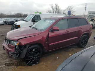 2018 Jeep Grand Cherokee Laredo with VIN 1C4RJFAG2JC309746, listed as a Copart auction lot 84270004 with 162,703 mi miles and Salvage title. Bid and sale history available at DreamBid. Image 1.