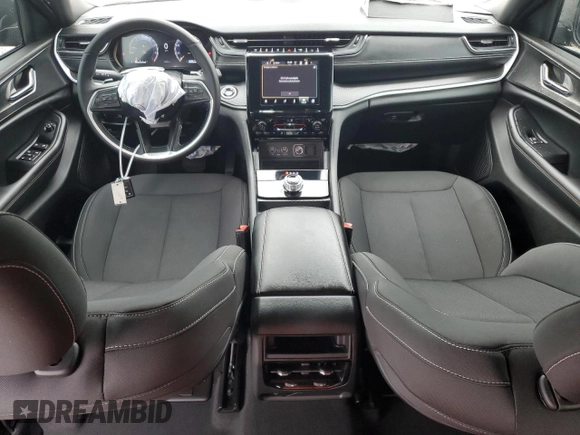 2025 Jeep Grand Cherokee Laredo with VIN 1C4RJHAG1SC278728, listed as a Copart auction lot 45920395 with 3,850 mi miles and Salvage Title. Bid and sale history available at DreamBid. Image 8.