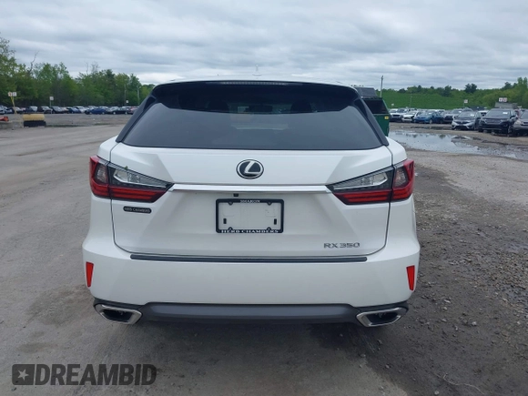 2016 Lexus RX 350 z VIN 2T2BZMCA4GC004770, wystawiony jako IAAI lot #42320148 z przebiegiem 77 054 mil mil oraz . Historia ofert i sprzedaży dostępna na DreamBid. Obrazek 16.