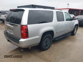 2014 Chevrolet Suburban LS with VIN 1GNSCHE08ER217393, listed as a IAAI auction lot 41563635 with 212,852 mi miles. Bid and sale history available at carsss.com. Image 4.