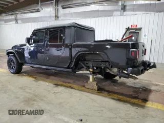 2021 Jeep Gladiator Willys with VIN 1C6HJTAG4ML556255, listed as a Copart auction lot 57143125 with 57,104 mi miles and Salvage title. Bid and sale history available at DreamBid. Image 2.