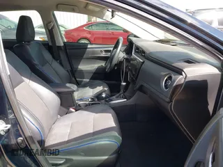 2019 Toyota Corolla L with VIN 2T1BURHE0KC154489, listed as a IAAI auction lot 41840201 with 112,248 mi miles and . Bid and sale history available at DreamBid. Image 5.